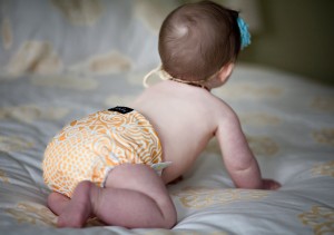 My daughter at 8 months in one of my favorite cloth diapers.